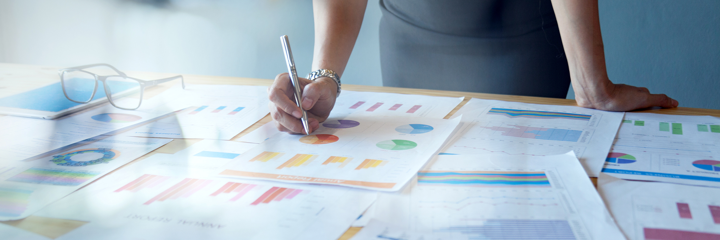 woman reviewing graphs