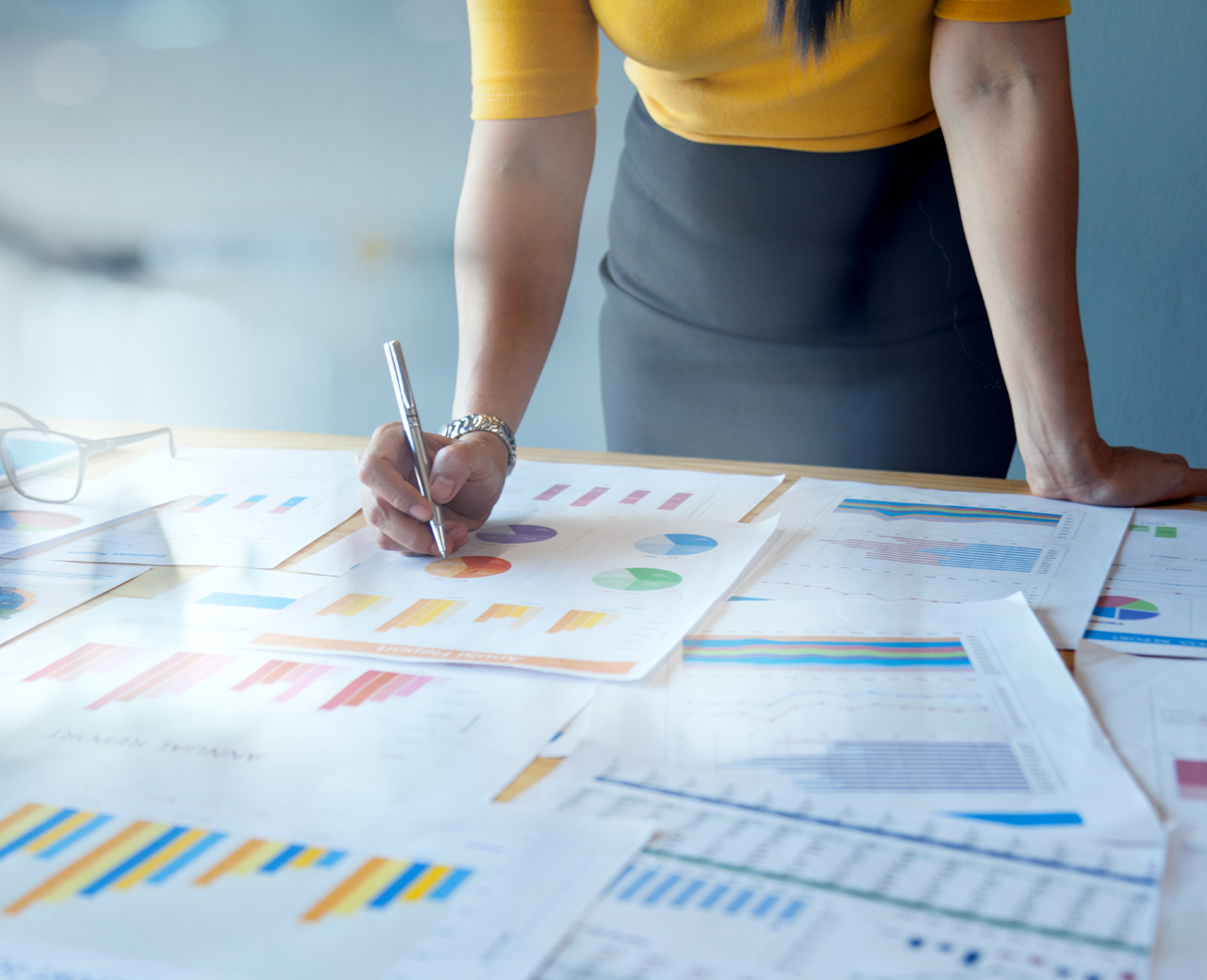 woman reviewing graphs