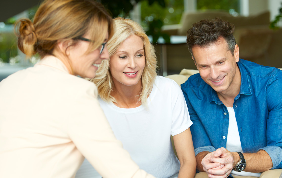 young couple with financial professional