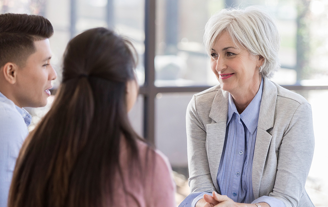 young couple with financial professional