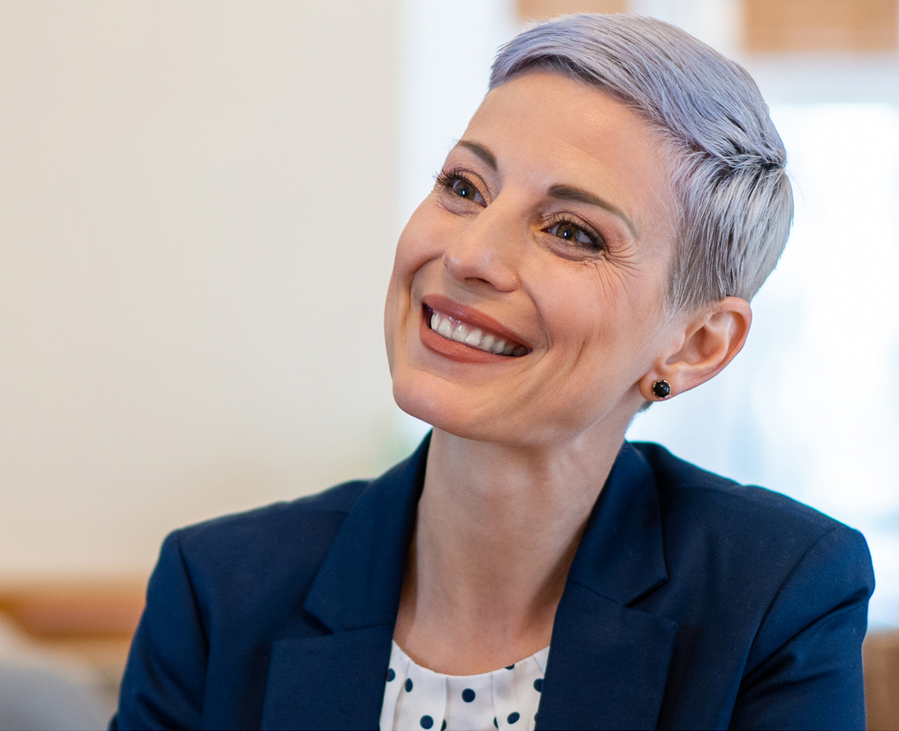 woman in suit with client