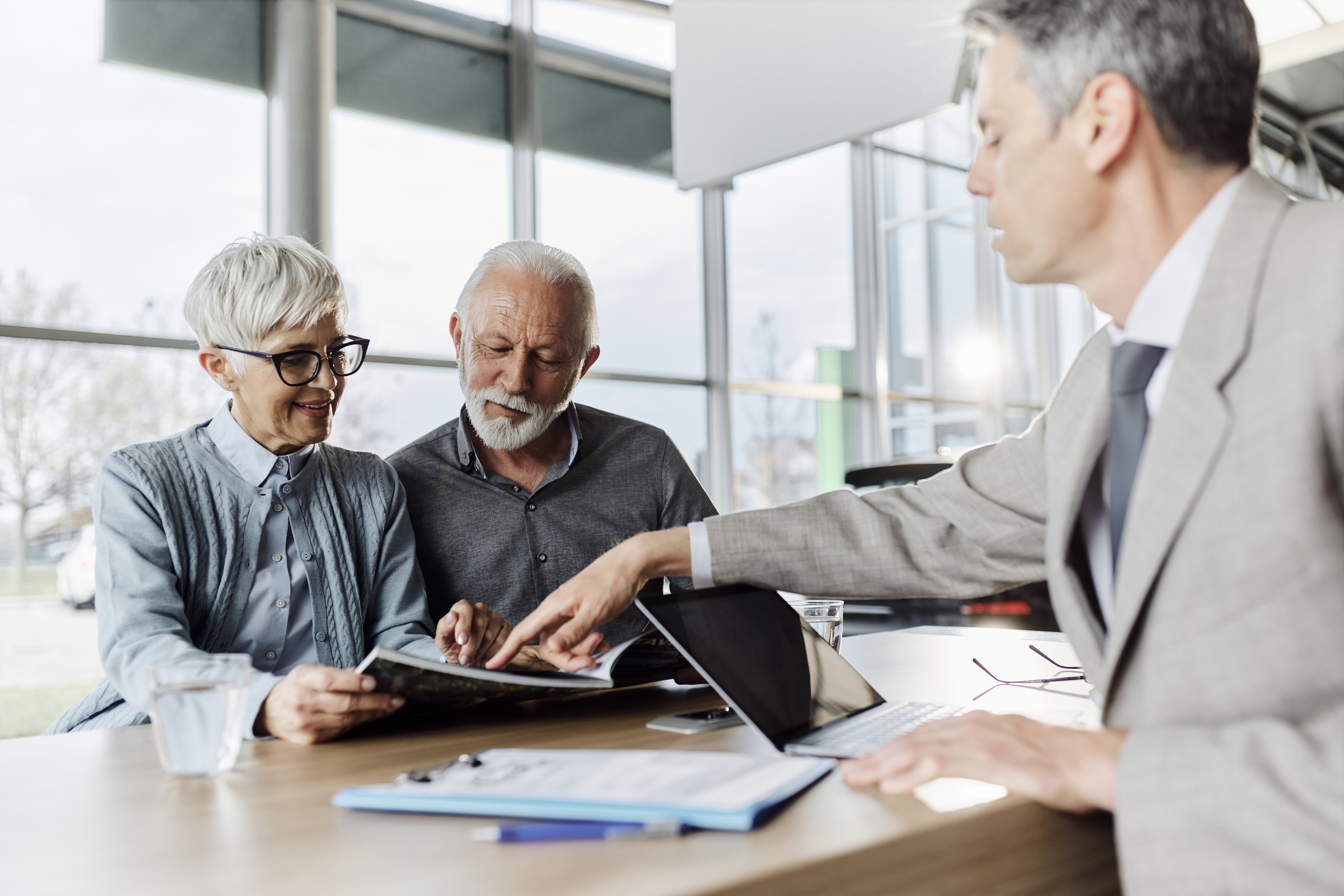 Financial Advisor Pointing to a Document