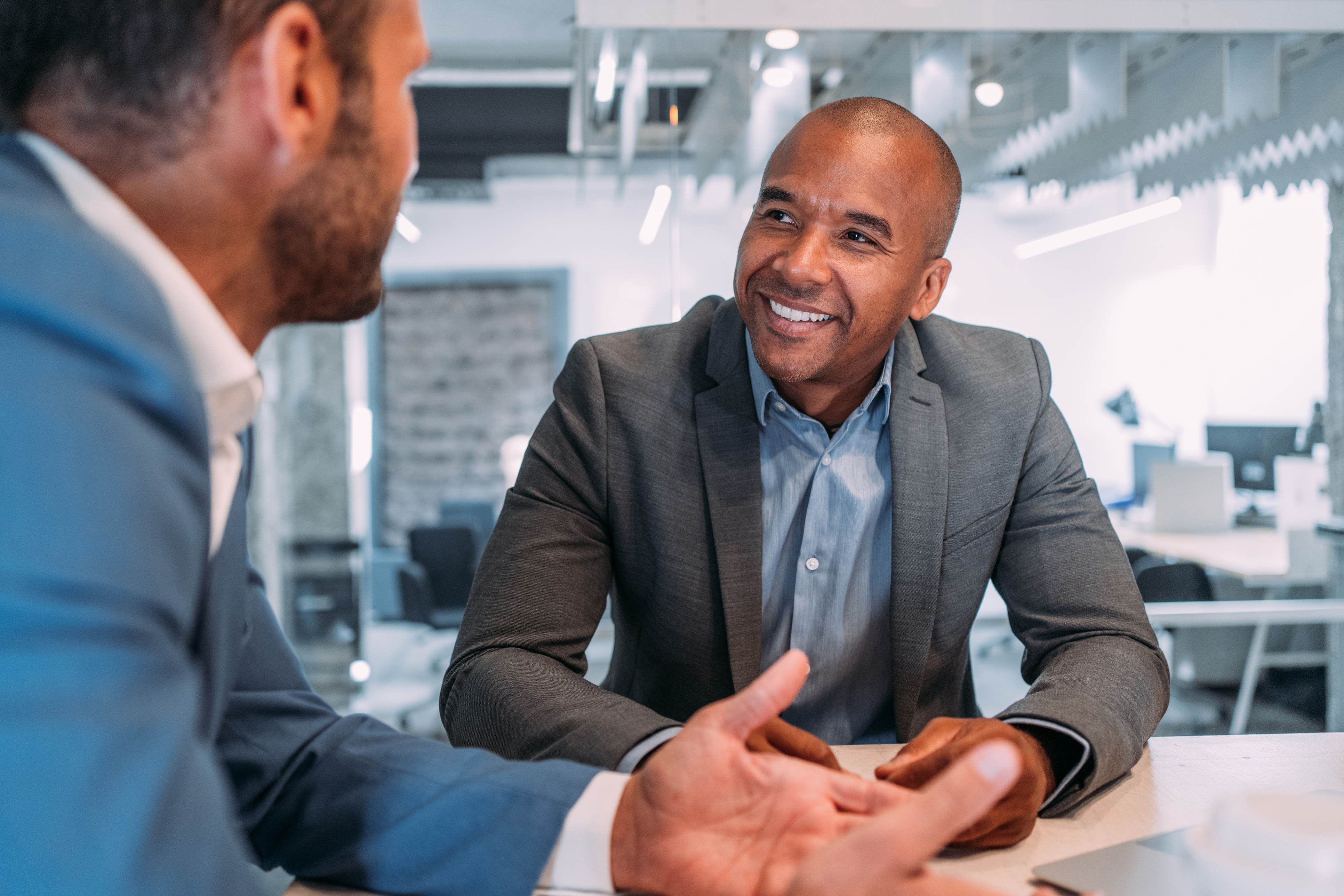 Financial Advisor sitting with client