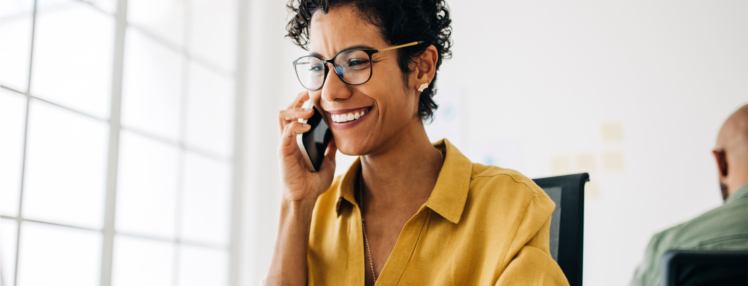 Financial Advisor on the phone with a prospective client.