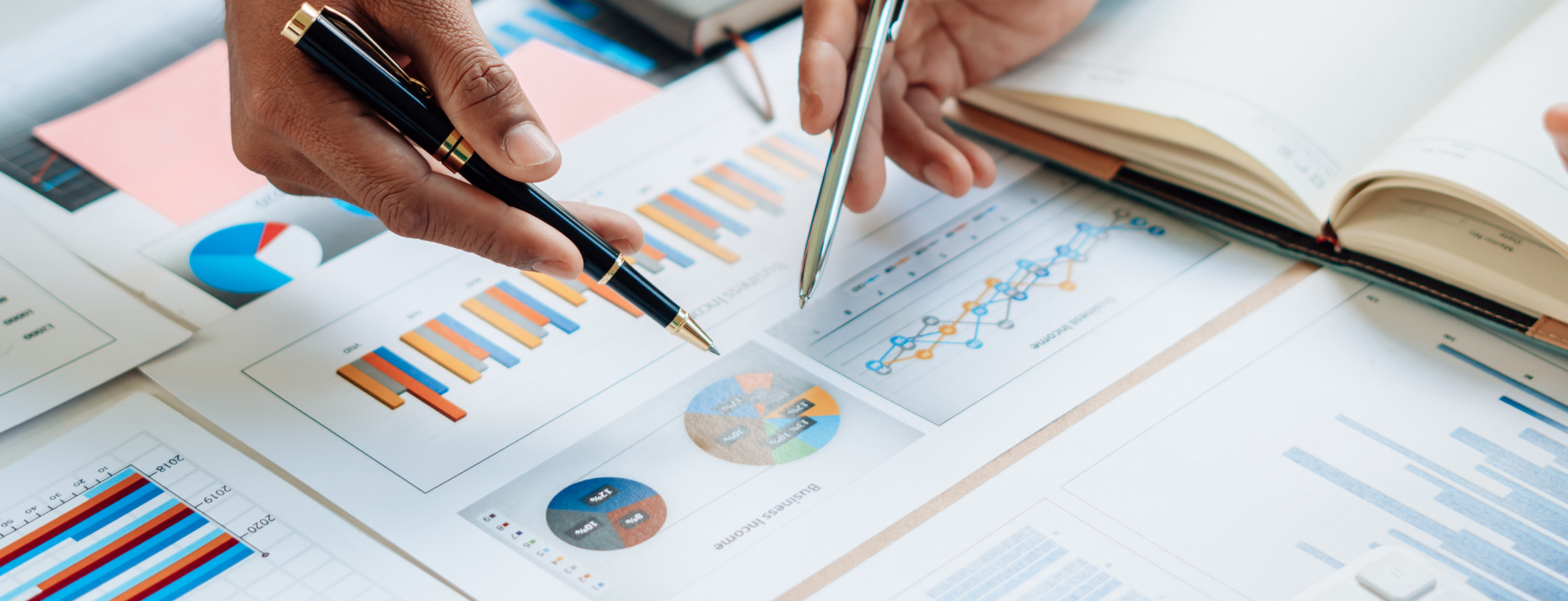 Close up of financial charts showing strategic growth.