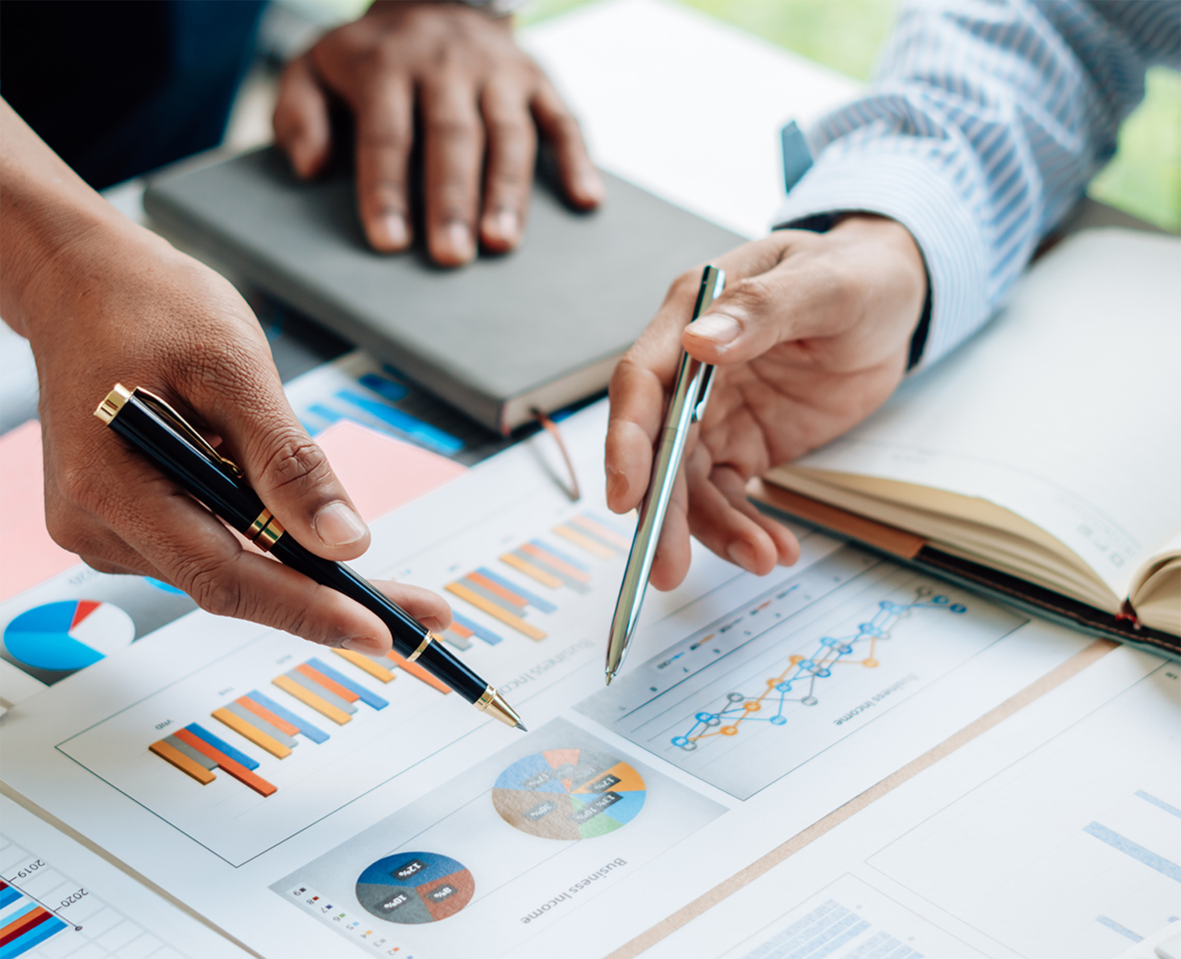 Close up of financial charts showing strategic growth.