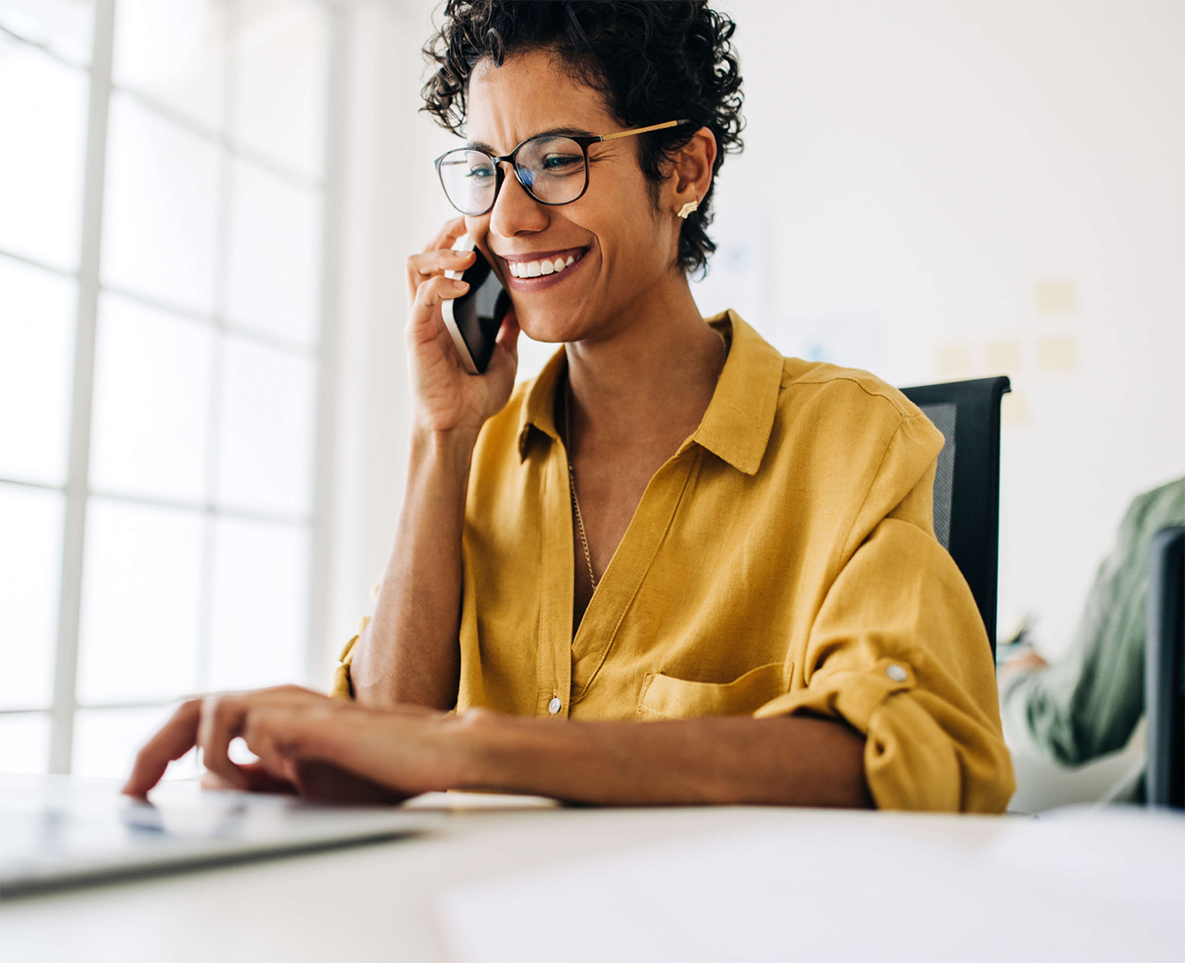 Financial Advisor on the phone with a prospective client.