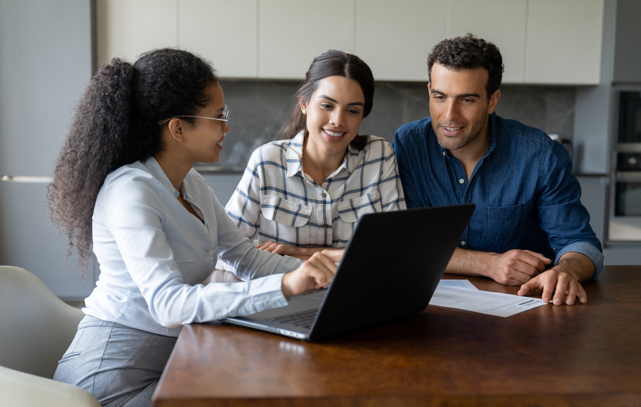 Image of advisor working with family.