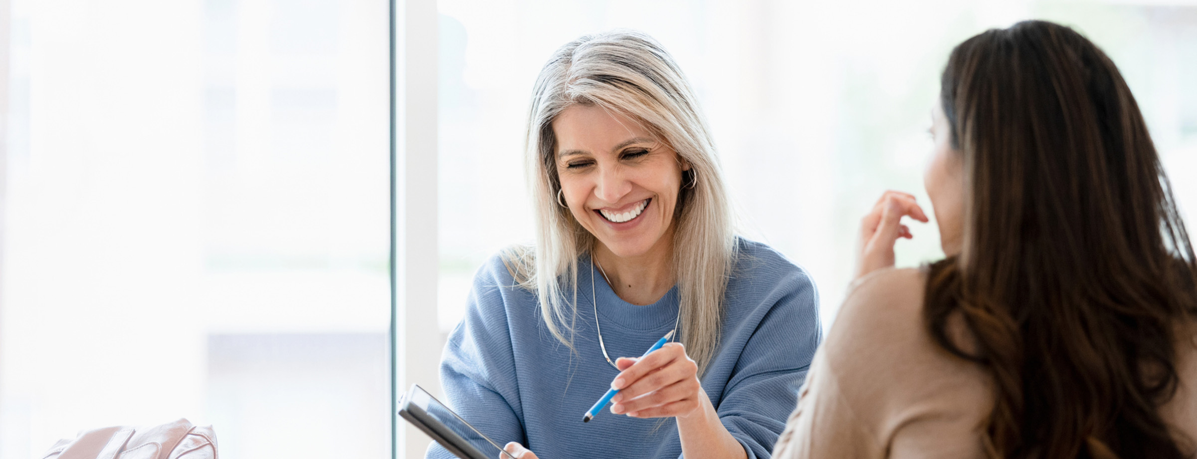 Image of female advisor working with client